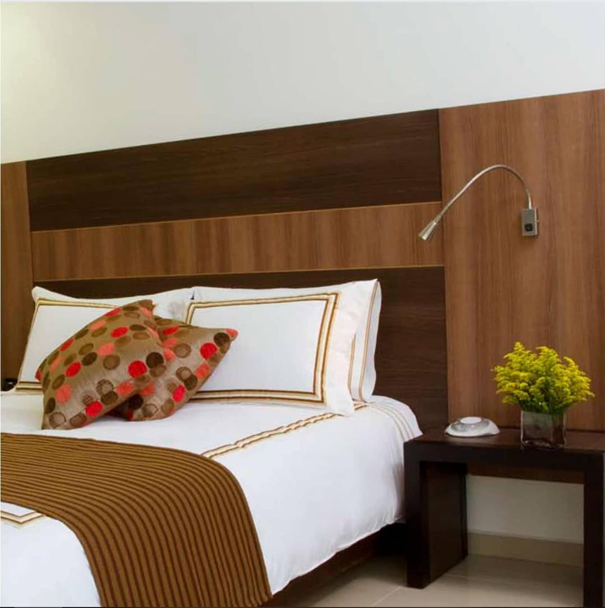 San Simon Hotel Pereira By Soratama Екстериор снимка A wall mounted reading light