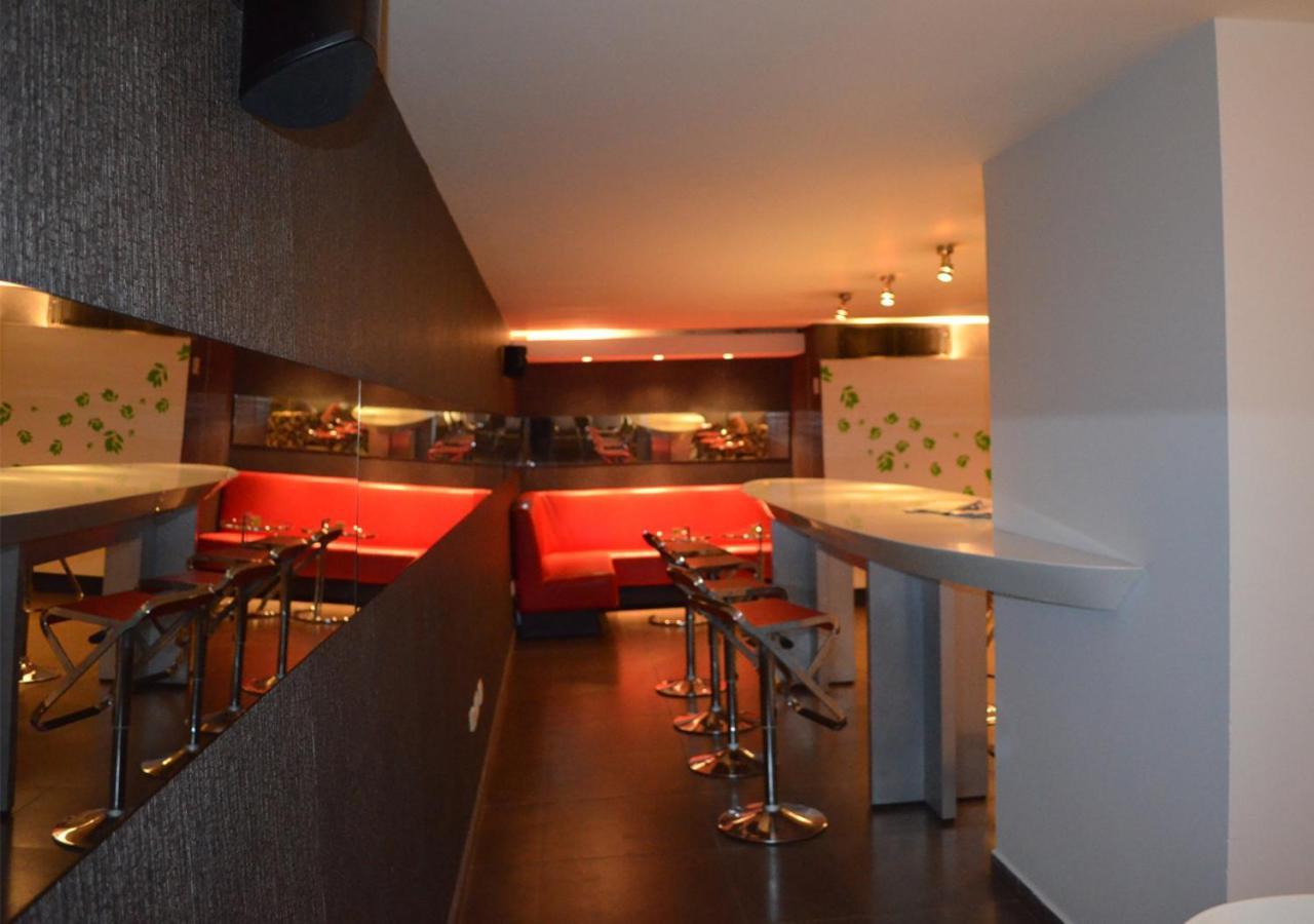 San Simon Hotel Pereira By Soratama Екстериор снимка The interior of the restaurant